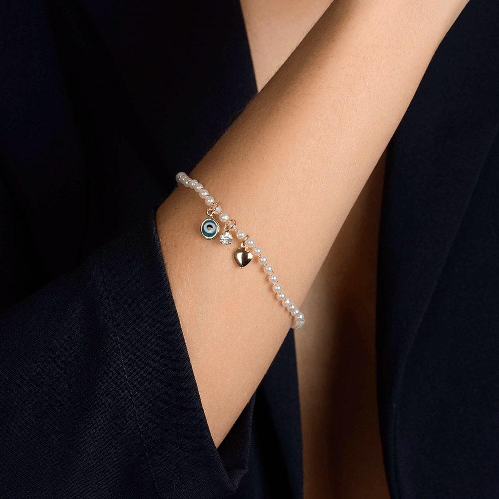 Micro Pearls and Greek Evil Eye Cham Bracelet in Gold_Model